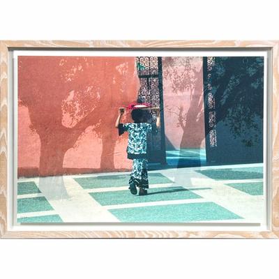 Diane Love (American, Contemporary), Limited Edition Pigment Print | Rome. In shades of peach, green and blues. Woman carrying item on...