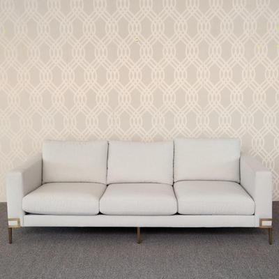 THAYER COGGIN SOFA | A contemporary modern style three cushion sofa by Thayer Coggin in grey fans fabric upholstery over tapered square...