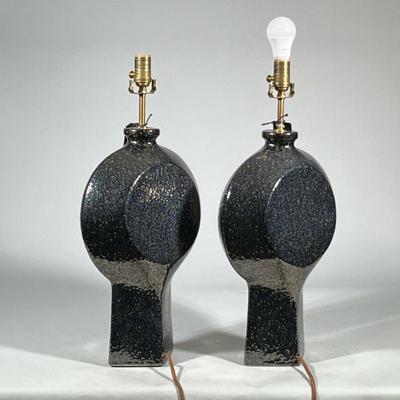 (2pc) Pair Tall Nicolae Mid-Century Modern Ceramic Lamps | Geometric shaped lamps with dark, textured black metallic glaze finish,...