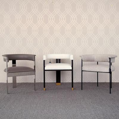 (3pc) CURVED BACK CONTEMPORARY ARMCHAIRS | Mixed lot of three similar curved back armchairs of modern contemporary design, including...