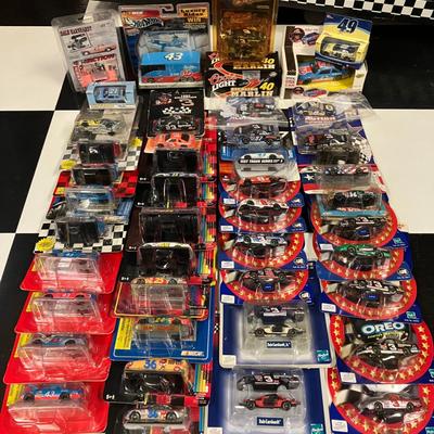 Approximately 40 Racing Champions, Winner's Circle, and Misc 1:64 NASCAR Diecast Cars