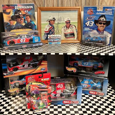 Richard Petty, Kyle Petty, Adam Petty, and John Andretti NASCAR Collectibles (1 Signed Picture)