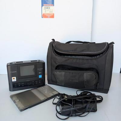 Sale Photo Thumbnail #186: Canon Selphy CP1300 Printer w/ USA Gear Messenger Bag