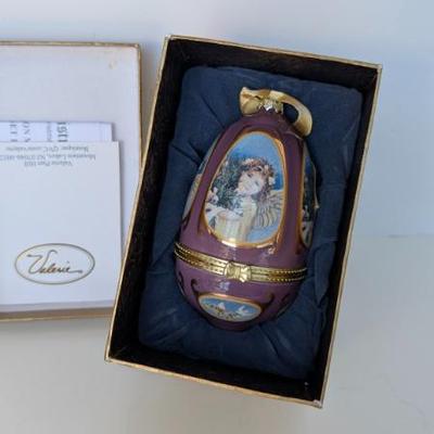 Sale Photo Thumbnail #209: Mr. Christmas Musical Porcelain Egg Ornament by Valerie Parr Hill