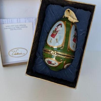 Sale Photo Thumbnail #211: Mr. Christmas Musical Porcelain Egg Ornament by Valerie Parr Hill