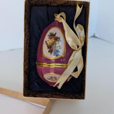 Sale Photo Thumbnail #202: Valerie Parr Hill Porcelain Purple Egg Music Box