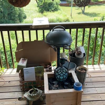 Outdoor patio items featuring an electric grill 