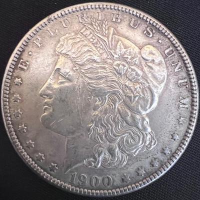 1881 And 1900 Morgan Silver Dollars