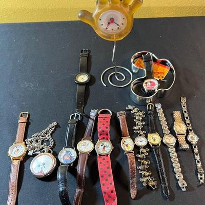 A Collection Of Mickey Mouse And Disney Watches
