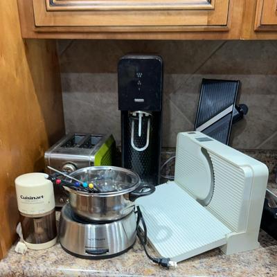 Kitchen Helpers Featuring Electric Meat, Slicer, Bella, Toaster, Fondue Pot And More