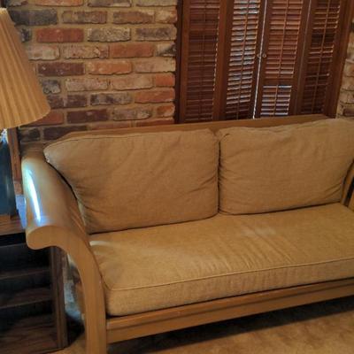 Sturdy Couch With Beautiful Lamp And Small Side Table