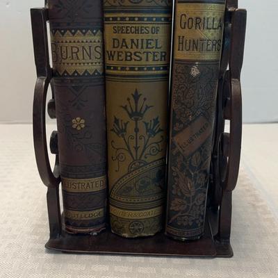 Metal Book Ends And Three Books