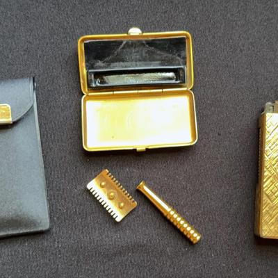 Vintage Dunhill Rollable Lighter & miniature travel razor
