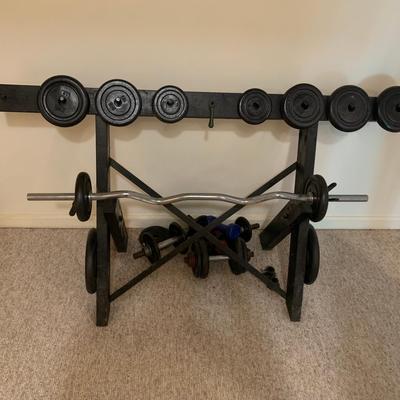 Home made wood rack with weights and dumbells