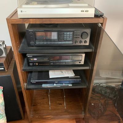 Stereo system w cabinet, DVD,VHS,radio and record player