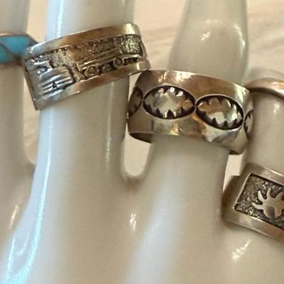 (5) Navajo Sterling Silver Rings (2) Gibson Gene (1) Turquoise Inlay (1) Stamped Band (1) Band - 21.6 Grams