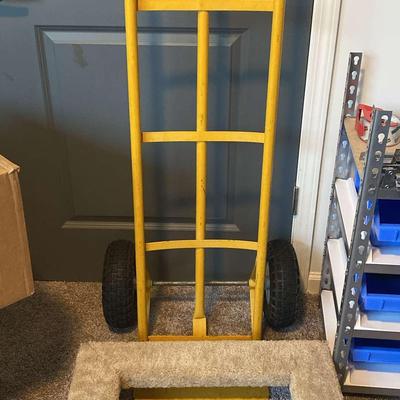 Appliance Dolly And Carpeted Moving Aid On Wheels
