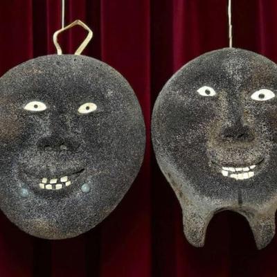 Inuit carved maskettes male female pair 8