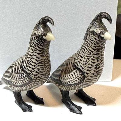 Pair of scrimshaw figurines artist unknown