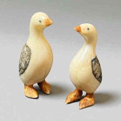 Pair of scrimshaw bird carvings