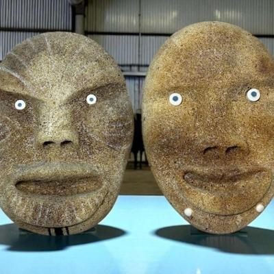 Inuit carved maskettes male female pair 2
