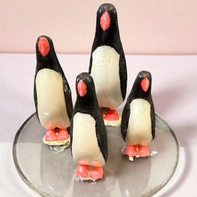 Carved penguin figurines