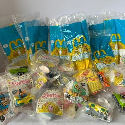 Vintage McDonald's toys- Dinosaurs, Barbie, Batman, and Looney Tunes