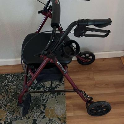 HKM030 - Red Walker with Wheels - Has a Seat w/Storage Too