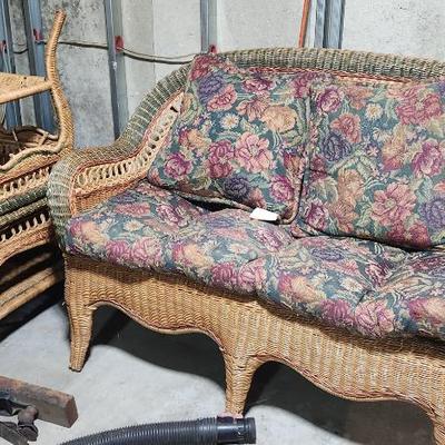 Wicker loveseat tables