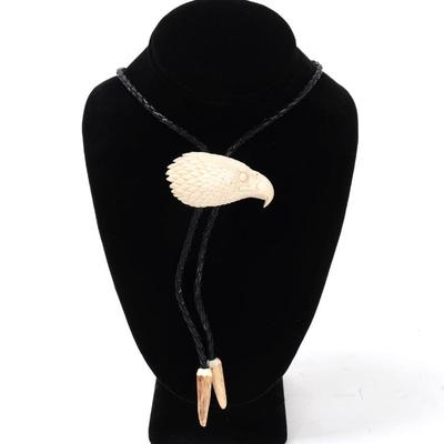 Sale Photo Thumbnail #134: Lot 134 antler carved eagle bolo tie