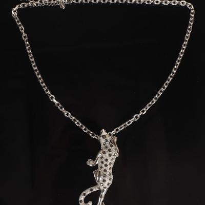 Sale Photo Thumbnail #145: Lot 145 cartier style silver leopard pendant