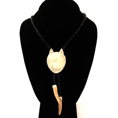 Sale Photo Thumbnail #144: Lot 144 antler carved bolo tie wolf