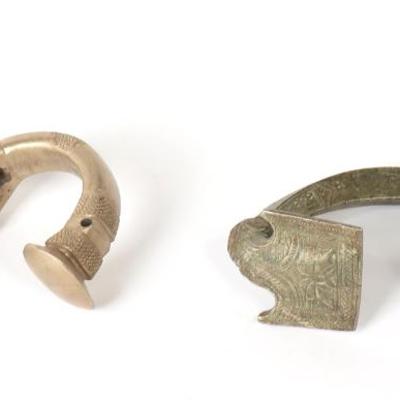 Sale Photo Thumbnail #140: Lot 140 two large west african metal bangles