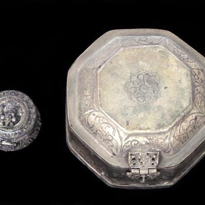 Sale Photo Thumbnail #516: Lot 517 collection of nesting silver boxes