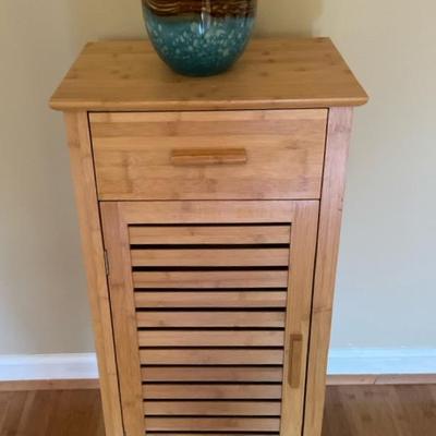 Bamboo Cabinet with Decorative Vase