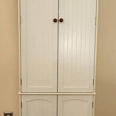 Tall White Storage Cabinet