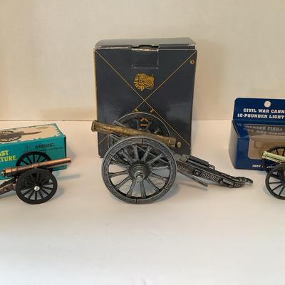 Three Cannon Figurines 