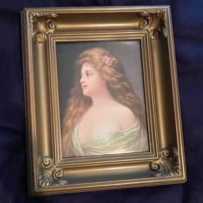 Porcelain plaque woman with flower in hair