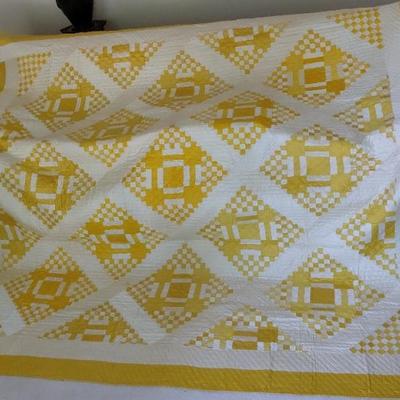 Handmade yellow and ivory quilt made in 1900