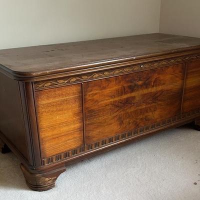 Wood chest with carved decorative trim