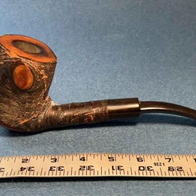 Rustic briar wood pipe