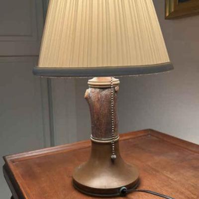 Brass and log lamp