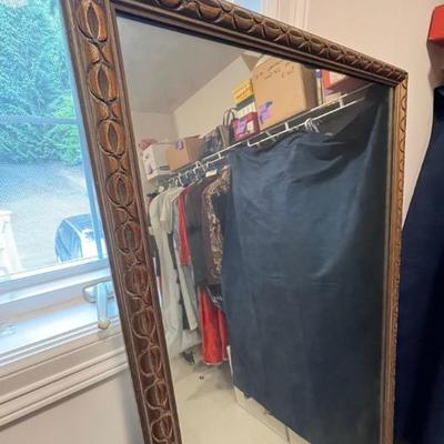 Long mirror carved bronze colored frame
