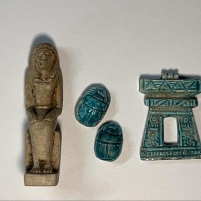 Egyptian brass sphinx inkwell two scarabs, amulet, and figure
