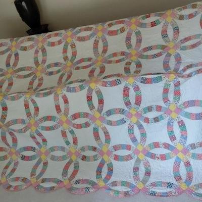 Handmade double wedding ring quilt from 1940s