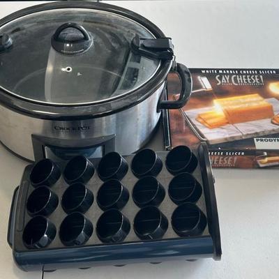 Stainless Crock-pot , Keurig K-cup Carrousel , And A Say Cheese White Marble Cheese Slicer In Box