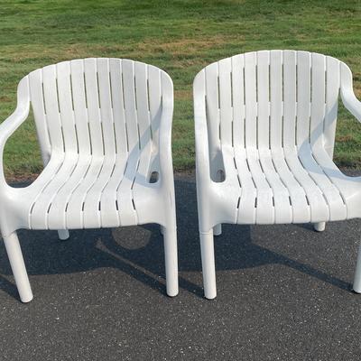 (2) White Heavy Plastic Lawn Chairs