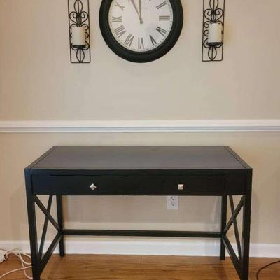 Arbor Emery Wall Clock, Black Metal Sconces, and Modern Black Writing Desk