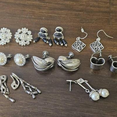 8 Pairs Of Silver Tone Earrings 