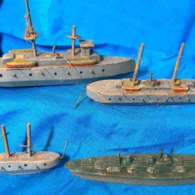 Antique carved wooden military ships